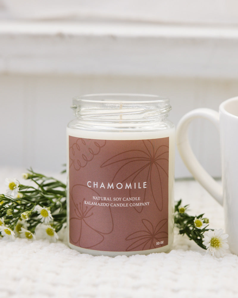 Fragrant chamomile and jasmine fill this candle with a calming essence. Crushed lavender and sparkling orange bring life and vibrance to the room where it slowly burns. Made in Kalamazoo, MI USA.