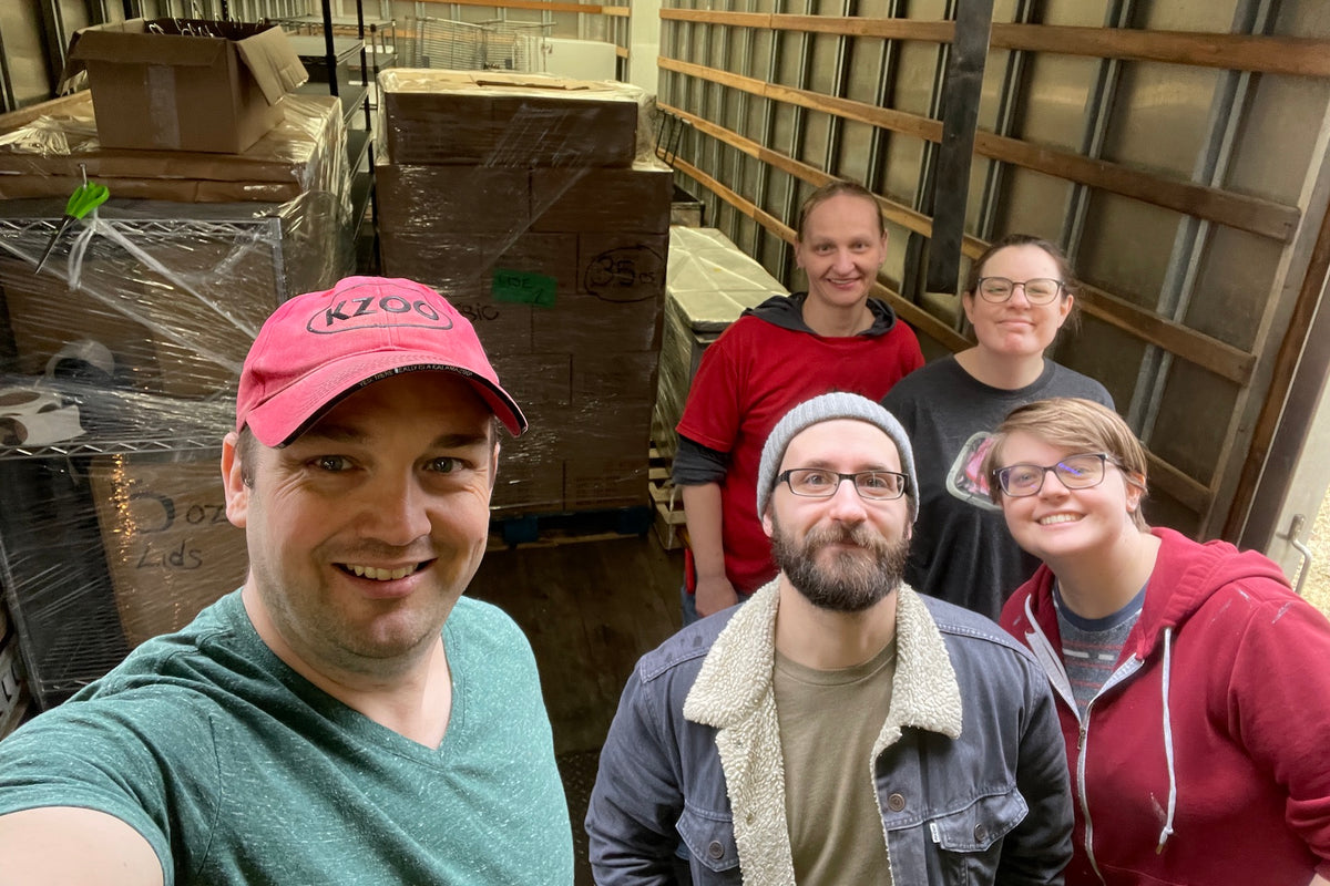 A team of candlemakers at the warehouse