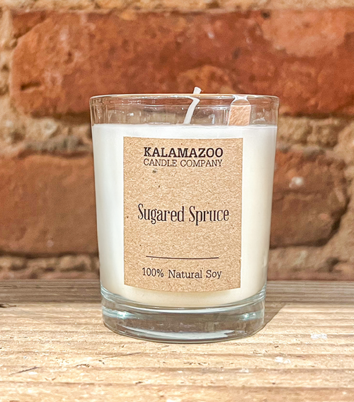 Fragrant spruce, bundled with white pine and Douglas fir, brightened by tart raspberries and juicy mandarins, and mellowed by vanilla bean and eucalyptus. Handmade in Kalamazoo, MI.
