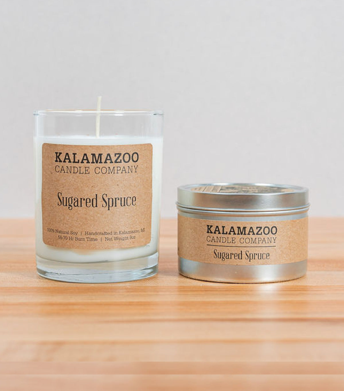 Fragrant spruce, bundled with white pine and Douglas fir, brightened by tart raspberries and juicy mandarins, and mellowed by vanilla bean and eucalyptus. Handmade in Kalamazoo, MI.